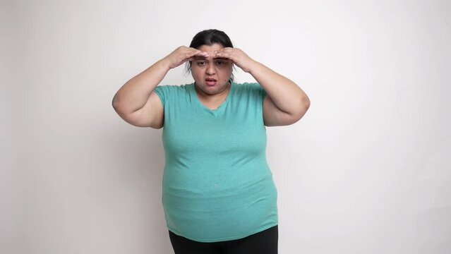 Sad unhappy overweight indian woman unhappy with her excessive betty fat, weight loss and obesity concept. 4k