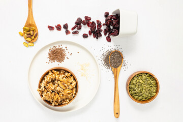Nutrient rich dry nuts and seeds, still life, overhead view