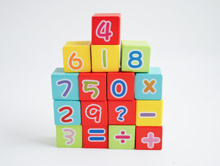 Number wood block cubes for learning Mathematic, education math concept.