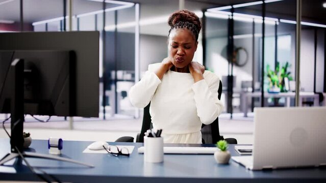 Improving Workplace Wellness: African American Woman Suffers