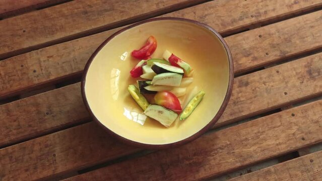 all slice veg like potato, onion, parwal, tomato, bringal mixed together