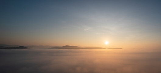 Panorama view. sunrise scene with mist and mountain