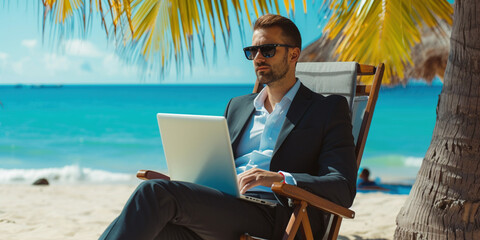 Adult man in a business suit working on a laptop outdoors on the beach shore sea on background. Professionalism, seniority, and modern lifestyle freelancer at any age concept