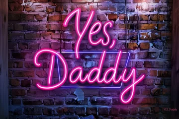 The text Yes, Daddy is written in neon sign in glowing pink color on a wall of a house with a fancy font. © MeSSrro