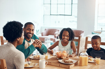 Black family, parents and kids for breakfast in morning with eating, bonding and happy in dining room. Love, mother and father with children with food, eggs and bread for nutrition and hungry in home