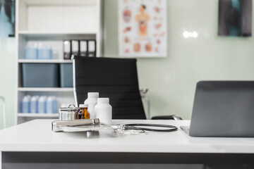A clean desk with medical equipment, ready for professional use, sits empty, awaiting the next task or appointment.