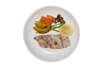 Sea bass steak, asparagus, pumpkin, lemonade, champignon mushrooms, carrots and on isolated white background.