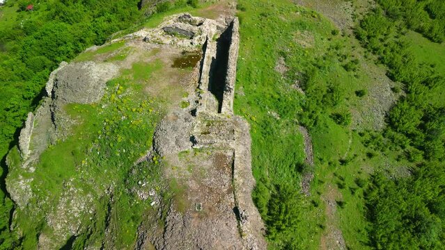 Aerial view of Ruins of ancient Vishegrad Fortress on the southern coast of Studen Kladenets reservoir near town of Kardzhali, Bulgaria
