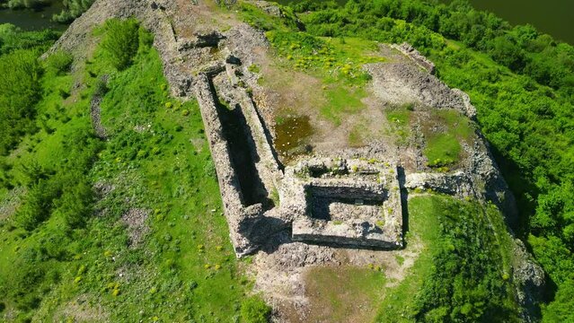 Aerial view of Ruins of ancient Vishegrad Fortress on the southern coast of Studen Kladenets reservoir near town of Kardzhali, Bulgaria
