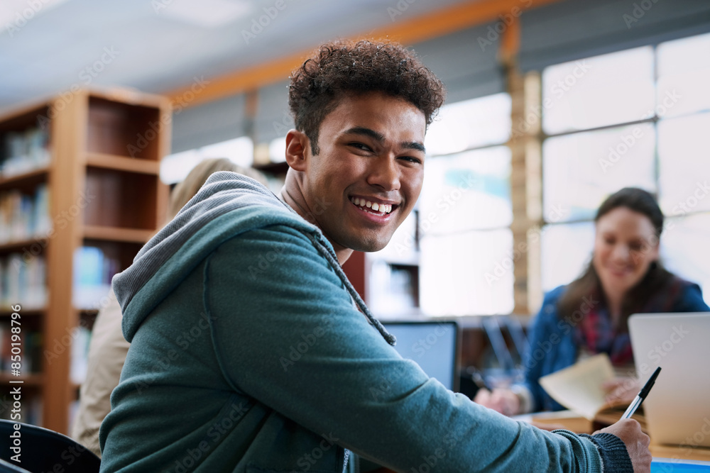 Poster university student, man and happy with portrait in library for writing, scholarship and studying for