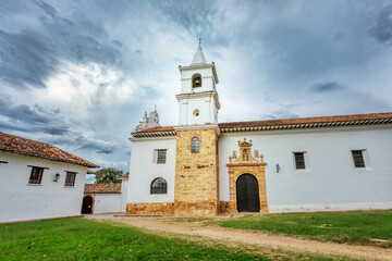 Naklejka premium Monasterio De Carmelitas Descalzas in Villa de Leyva, colonial town known for Plaza Mayor, largest stone-paved square in South America, historical UNESCO architecture. Boyaca, Colombia.