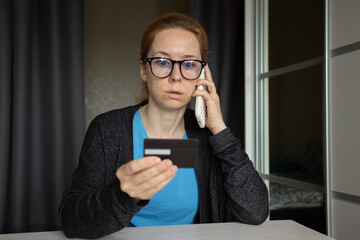 Bank theft, woman with smartphone talking to scammers, online shopping fraud, customer paying rent,...