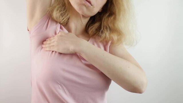 Breast self-examination, person screening for cancer, medical diagnostic checkup, white background