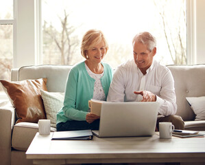 Senior couple, documents and laptop on sofa with discussion, smile and manage taxes in home. Old man, woman and computer with paperwork for compliance, reading and investment report with finance
