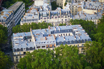 Obraz premium Aerial view of the city roofs in Paris, France.