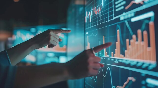 Data analyst at work. Using futuristic technology to analyze data and find patterns.