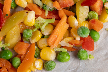 a mixture of quick-frozen corn, peas, peppers, and carrots