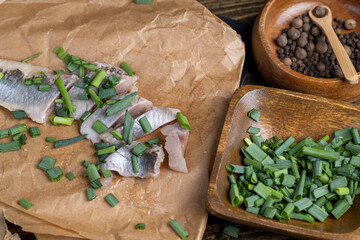 salted herring fillet on the table