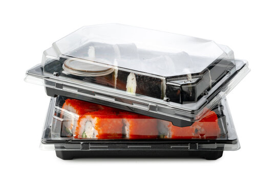 Take out packed sushi roll isolated on white