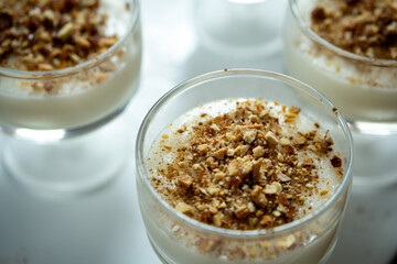 white fresh desert served in cup glass 