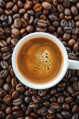 Fototapeta premium Coffee Cup on Pile of Beans
