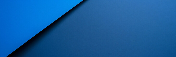 Minimalist blue background with a geometric shape resembling a piece of paper