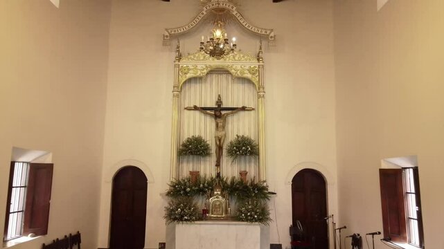 Slow aerial pushback on Jesus Christ statue in Pampatar Church on Isla de Margarita