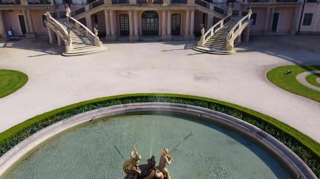 Esterhazy Palace with fountain on sunny day, aerial drone view, Fertod, Hungary