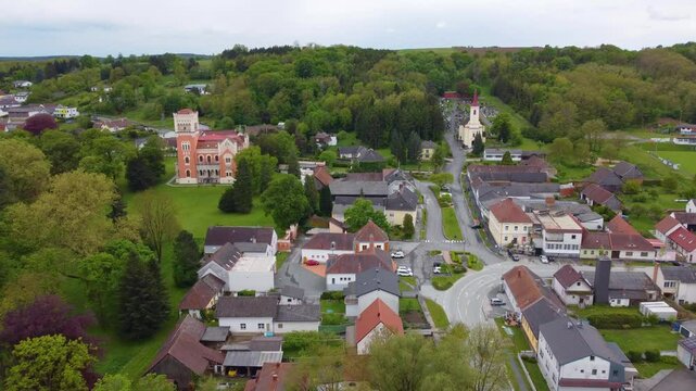 Rotentrum castle and small township nearby in Austria, aerial drone view