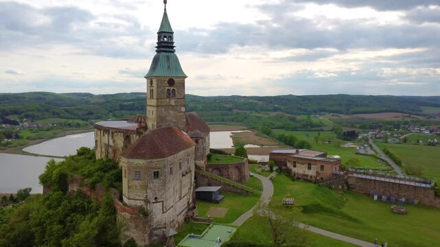 G&uuml;ssing Castle Overlooking Fields And Fish Pond In Burgenland, Austria. orbiting drone shot