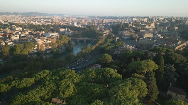 Aerial flyover establishes Orange Garden Rome Italy at sunset, calm peaceful city