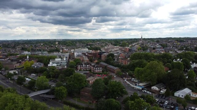 Drone shot Richmond city in South London. Dark stormy sky in England
