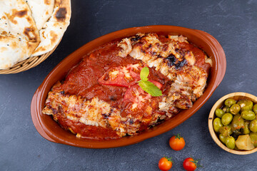Turkish_Iskandar Shawarma Meat With Souce, bread and olive. 