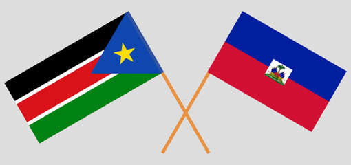 Crossed flags of South Sudan and Haiti. Official colors. Correct proportion