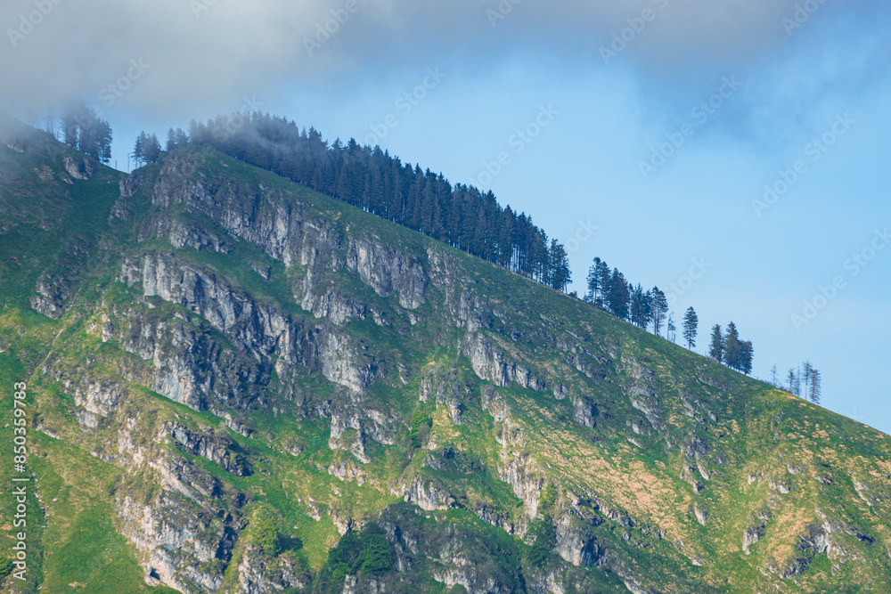 Canvas Prints The mountains and the landscape of lake Lugano, during a spring day, near the town of Brusino Arsizio, Switzerland - May 25, 2024.