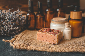 Cosmetics packaging. Set of different cosmetic bottles of cream or serum on a ceramic tray. Blank packaging. Natural beauty spa product concept. Beauty