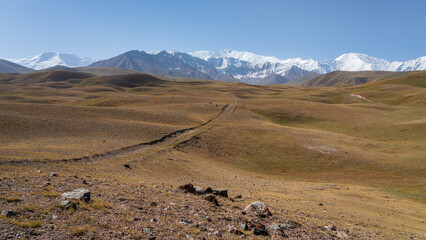 High altitude landscape view of Lenin Peak aka Ibn Sina peak in Trans-Alay aka Trans-Alai mountain range, Kyrgyzstan Pamir