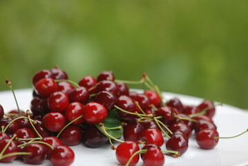Cherries on a plate, close-up, toned