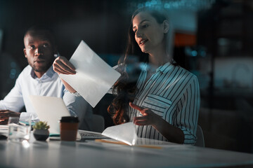 Business people, review and team report for company, portfolio document and pay roll audit. Accountant, night and analysis for invoice paperwork, project feedback and research for application