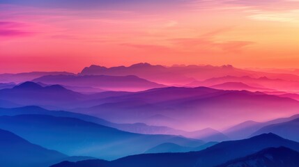 Fototapeta premium Layers of mountain ranges in gradient shades of blue and purple during a vibrant sunset, creating a serene and majestic landscape.