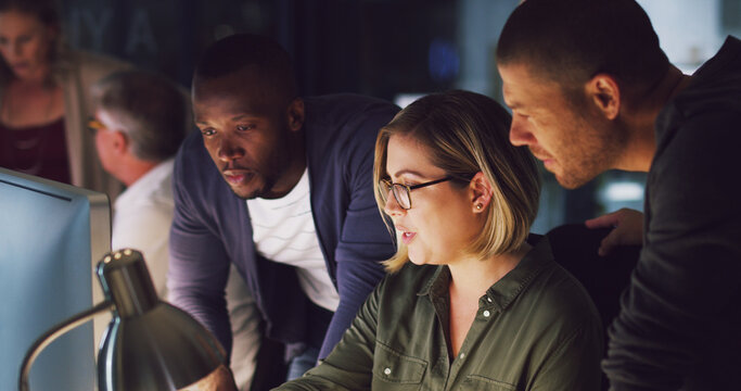 Group, problem solving or business people on computer for training, helping advice or research online. Woman teaching, supervisor coaching and IT support talking for learning or teamwork at night