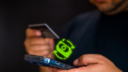 Closeup hand of a men is holding the credit card and using mobile phone for shopping online or exchange money