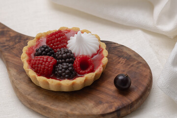Handmade soap. Handcrafted Soap.Home made soap look like cake with berries. Natural homemade cosmetics