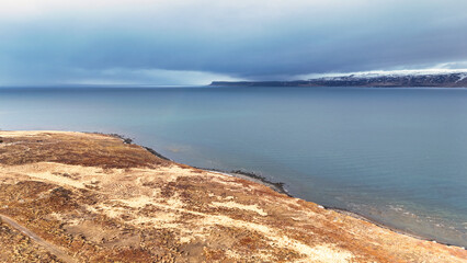 Rough sea with sky full of clouds in Iceland
