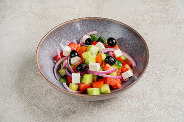 greek salad in the bowl, top view