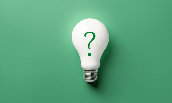 Light bulb with question mark on green background