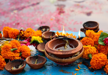 holy offerings of burning clay oil lamp for hindu god at festival from unique perspective