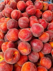 Fresh ripe peaches at the market