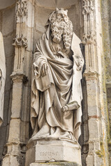 Fototapeta premium statue of moses at the entrance of the church of Auxonne in france