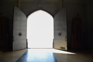 Open church door with a blue sky. New life, new start concept. Spiritual boost